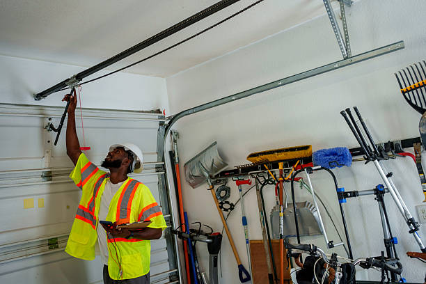 Professional Garage Door Installation technician working in Wayne, MI